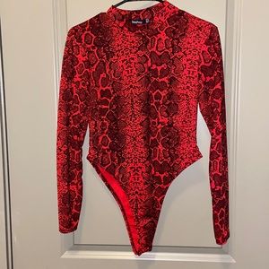Boohoo red snakeskin bodysuit.